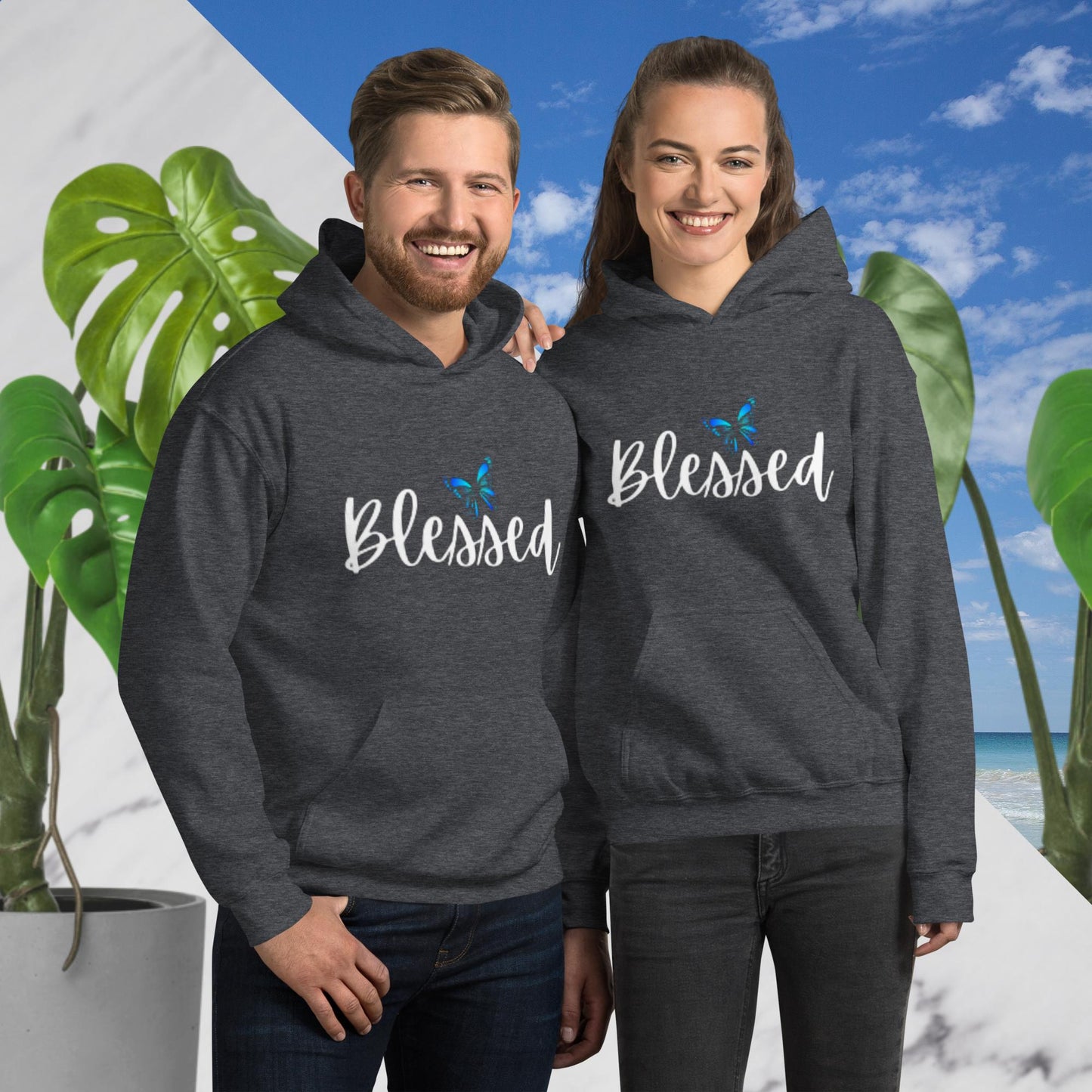 Dark heather unisex hoodie with a front pouch pocket, featuring the word 'Blessed' in white writing below a simple butterfly design.