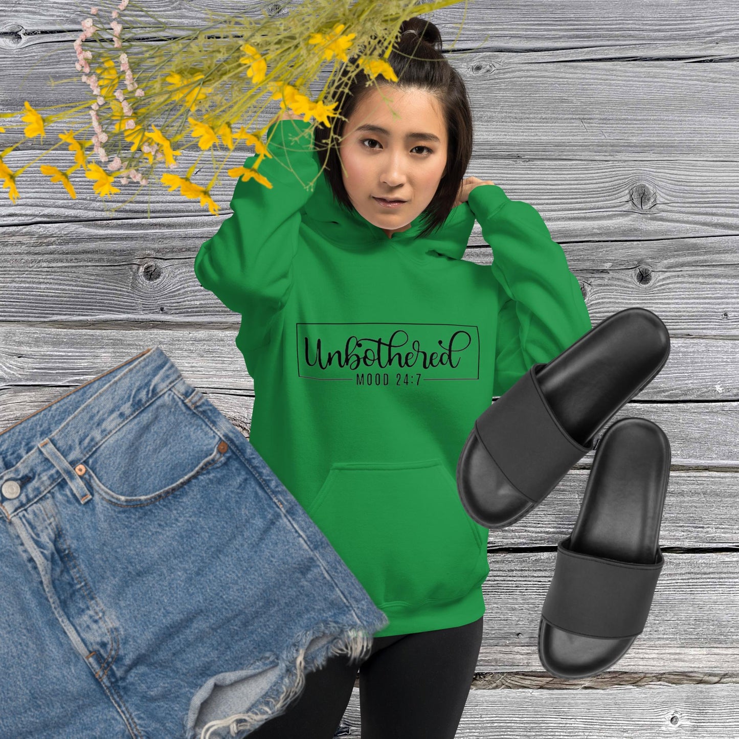 Irish green colored unisex hoodie featuring the word 'Unbothered,' serving as a reminder not to stress over things outside of your control.