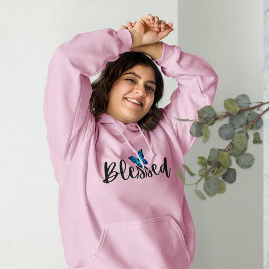 Pink unisex hoodie with a front pouch pocket, featuring a butterfly design above the word 'Blessed' in black writing.