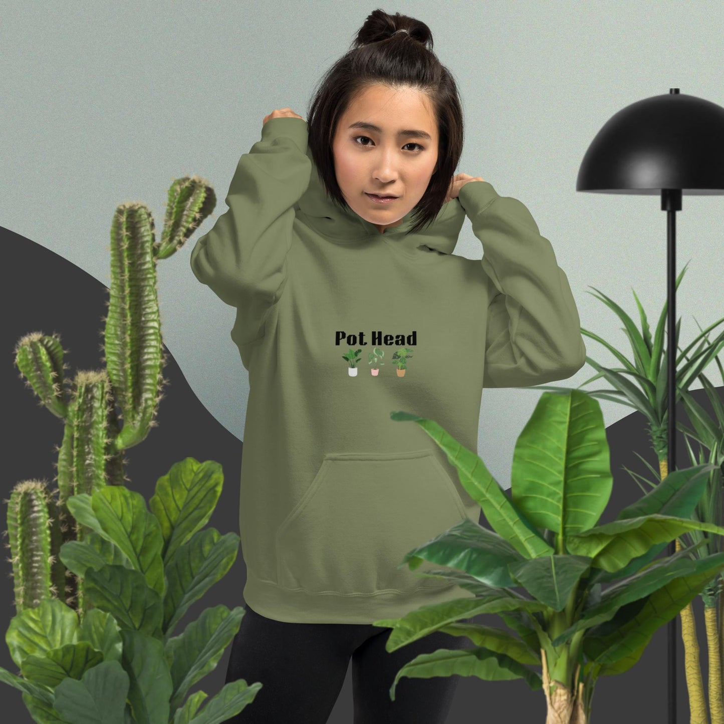 Military green colored hoodie designed for plant lovers, featuring the phrase 'Pot Head' in bold black text above the front pouch pocket, complemented by a decorative plant design