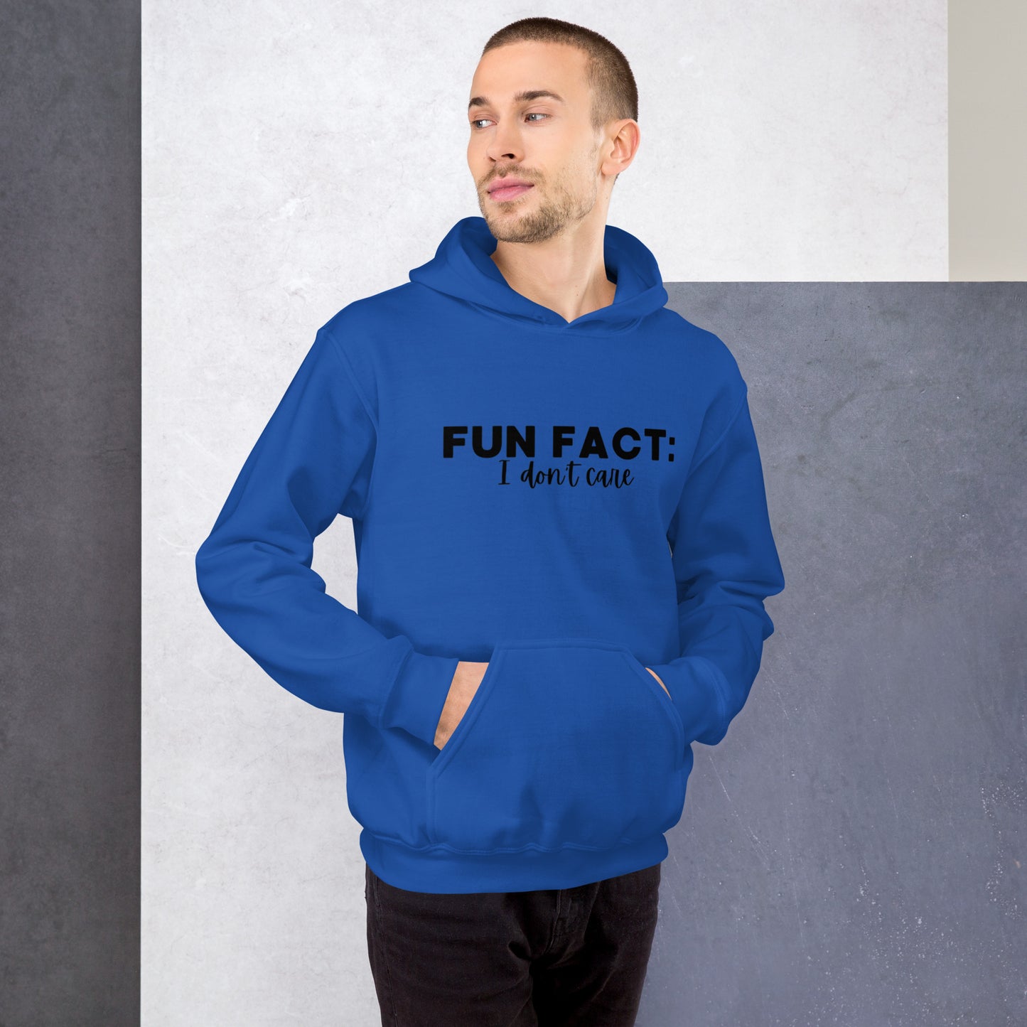 Royal colored unisex hoodie featuring the phrase 'Fun Fact: I Don't Care' in bold black writing on the front above the front pouch pocket