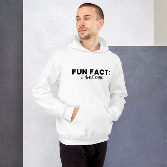 White unisex hoodie featuring the phrase 'Fun Fact: I Don't Care' in bold black writing on the front above the front pouch pocket