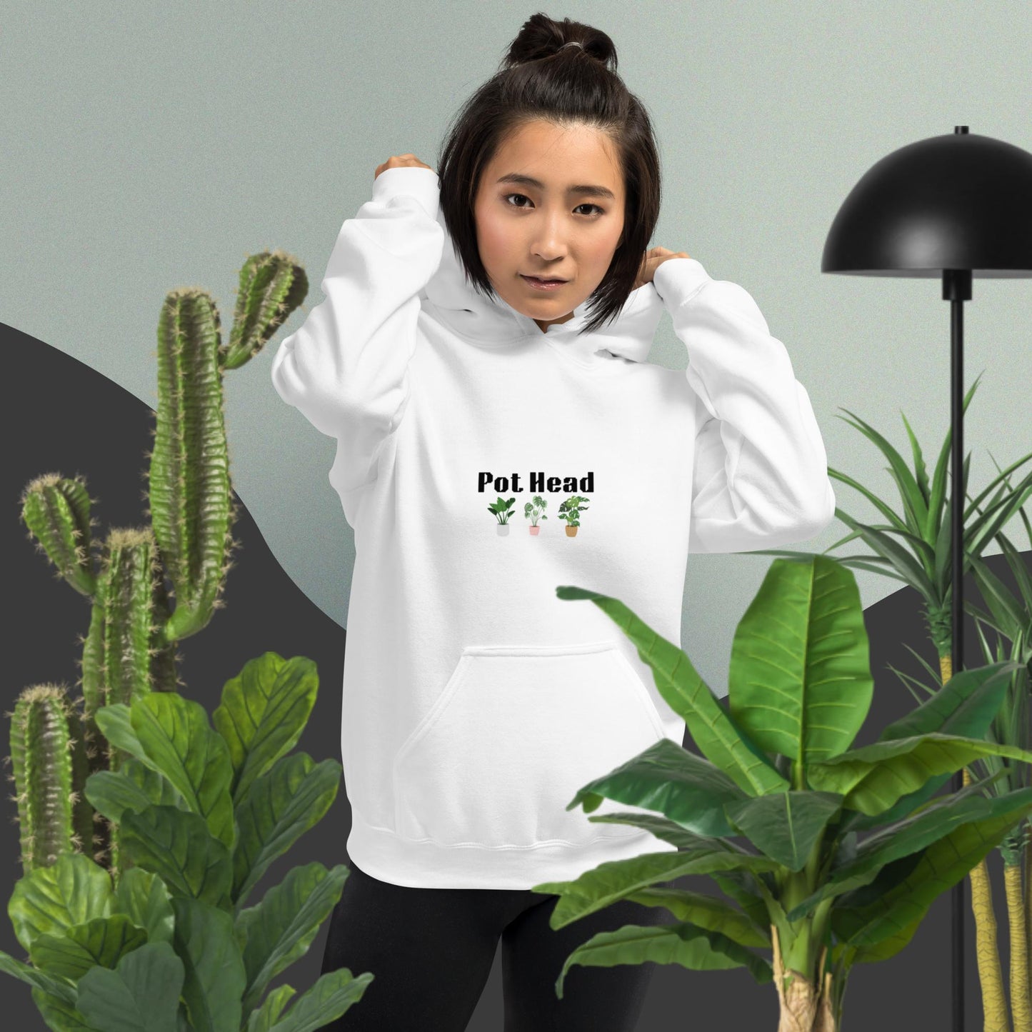 White hoodie designed for plant lovers, featuring the phrase 'Pot Head' in bold black text above the front pouch pocket, complemented by a decorative plant design